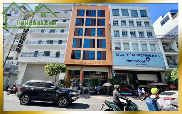 Cho thuê văn phòng mặt tiền Bạch đằng sát sân bay, văn phòng ốp kính thoáng đã, hầm xe - 3