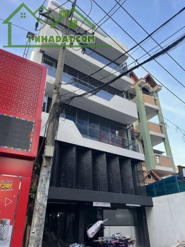 Bán tòa nhà mặt tiền đường Nguyễn Cửu Vân,P.17,Q.Bình Thạnh,Dt: 8 x 25,Hầm 7 lầu.Gía 66 tỷ - 2