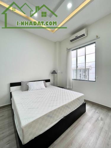 Bán nhà Phan Văn Trị - hẻm xe hơi 10m - kế bên Emart 4x14m CN 56m². Khu đồng Bộ 4 Tầng - 3