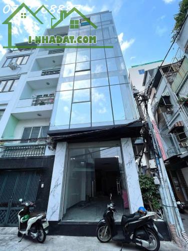 Bán tòa nhà VP Gần Hai Bà Trung Quận 1, 5 tầng đẹp HĐT 100tr/tháng