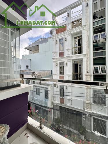 Bán nhà MTKD Hoàng Xuân Nhị, dt 5x21 4 Tầng giá 10 tỷ 9 tl - 4