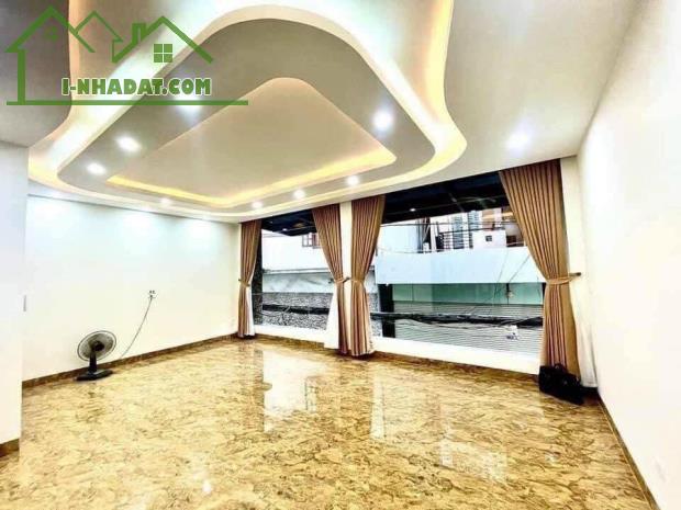 Nhà VIP cách 1 nhà ra phố Nguyễn Khang 7 tầng 56m2 thang máy, ô tô đỗ cửa, cho thuê KD tốt