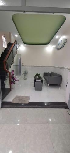 Nhà mới rất đẹp 1 trệt 1 lầu 4mx14,5m có 3PN sân cổng rào tân thới hiệp 21 metro