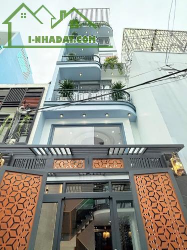 HÀNG HOT-NHÀ ĐẸP MỚI XÂY-1 TRỆT+3 LẦU+ST-DT:4Mx15,5M NỞ HẬU 4,5M-CÓ THANG MÁY-HXH