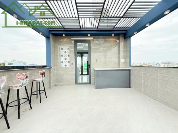 HÀNG HOT-NHÀ ĐẸP MỚI XÂY-1 TRỆT+3 LẦU+ST-DT:4Mx15,5M NỞ HẬU 4,5M-CÓ THANG MÁY-HXH - 2