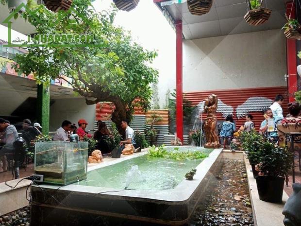 Bán nhà 1 trệt 2 lầu  sân thượng, 2 mặt tiền trước sau đường Tôn Đức Thắng và Phan Văn Trị - 3