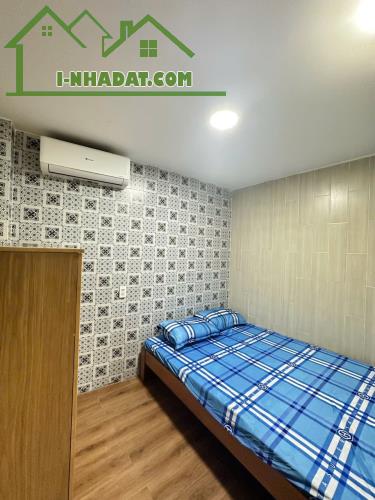 CHDV 5 TẦNG THANG MÁY - BÙI ĐÌNH TUÝ - 12 PHÒNG KHÉP KÍN CAO CẤP - 70TR/THÁNG - 16.3 TỶ. - 1