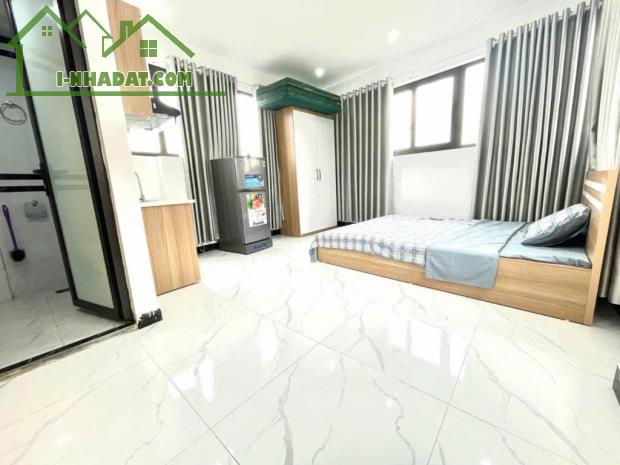 BÁN CHUNG CƯ MINI 7 TẦNG - 10 PHÒNG - ĐƯỜNG LÊ QUANG ĐẠO - CÓ THANG MÁY - 1