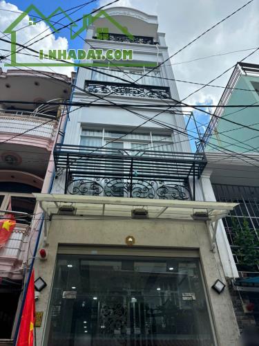 Bán nhà HXH  nhà cách 200m ra đường Lạc Long Quân Quận Tân Bình 33 m2, 4 PN, 6.8 tỷ