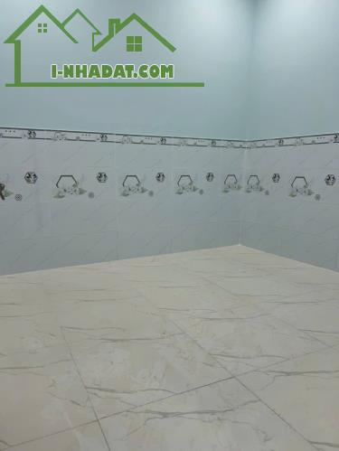 Nhà 1 trệt 1 lửng 1.55 tỷ.72 m2 ,sân ô tô,3 phòng ngủ - 3