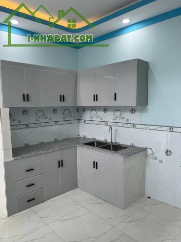 Nhà 1 trệt 1 lửng 1.55 tỷ.72 m2 ,sân ô tô,3 phòng ngủ - 5