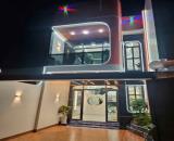 Nhà lầu mới xây dựng gần quảng trường full nội thất cao cấp hẻm xe hơi có sân đậu